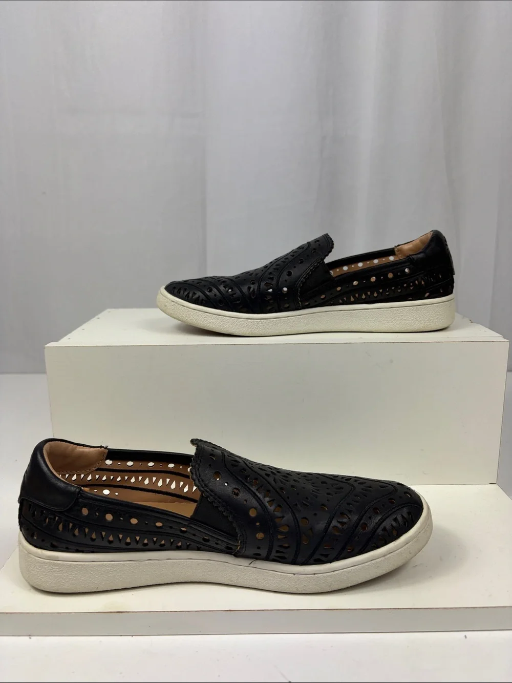UGG CAS‎ Perforated Slip On Sneaker in Black.